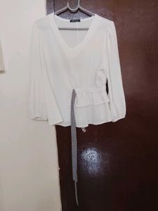 Chic White Peplum Top with Bow Accent