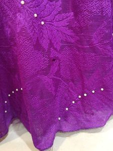 Elegant Purple Gown with Pearl Embellishments