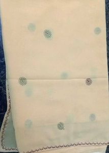 Elegant Cream Saree with Subtle Motifs