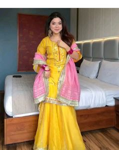 Vibrant Yellow Kurta Set with Pink Dupatta