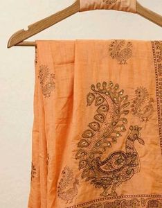 Orange Saree with Peacock Motifs
