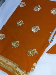 NEW ORANGE COLOURED SAREE WITH SEQUIN WORK