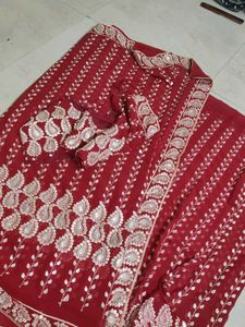 Elegant Maroon Embroidered Saree