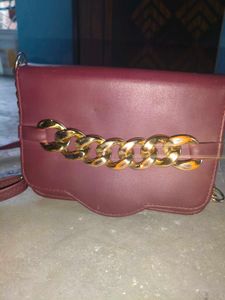 Chic Maroon Crossbody Bag with Gold Chain