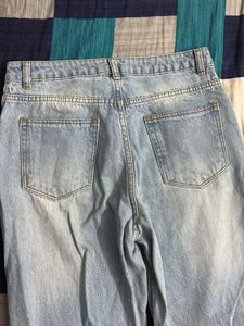 Ripped Knee Jeans