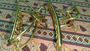 2 Golden Metallic Clutchers