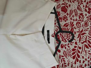 Egg shell white trousers for Women