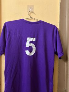 purple jersey with shorts