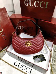 GUCCI* *GG MARMONT HALF-MOON-SHAPED MINI BAG*