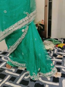 Elegant Teal Saree with Embellishments