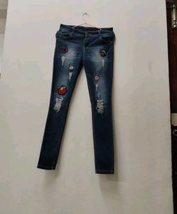 Distressed Denim Jeans