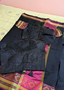 Elegant Black Saree with Pink Border
