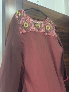 Elegant Maroon Kurta with Peacock Neckline