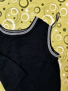 Sleeveless Black Top with Striped Neckline