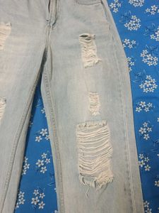 Distressed Light Wash Denim Jeans