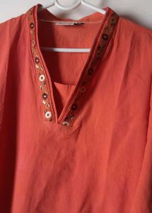 Unused Rust short embroidered Kurti.