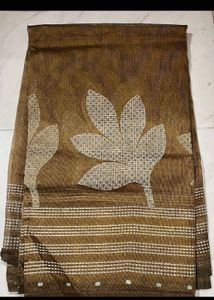 Elegant Brown Saree with Leaf Motifs
