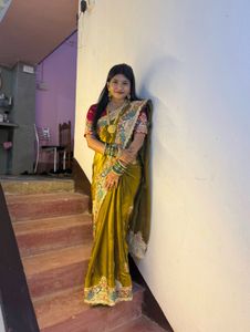 Exquisite Olive Green Embroidered Saree