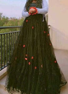Elegant Black Gown with Red Floral Accents
