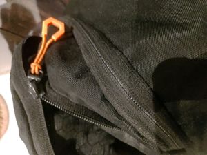 Neon Orange And Black Bag Zip Flaw