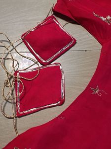 Vibrant pink suit with Silver Border