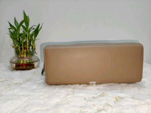 Elegant Beige Handbag with Silver Accent