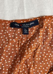Coral Polka Dots Peplum Top