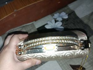 Elegant Gold Embossed Clutch Bag