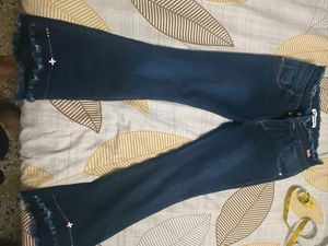Blue Denim Flare Jeans with Frayed Hem