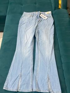 Light Wash Flared Jeans with Side Slits
