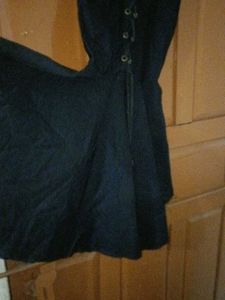 Sleeveless Black Dress with Lace-Up Front