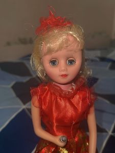 Elegant Doll in Red Gown