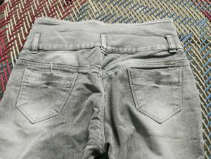 black top and  grey pant