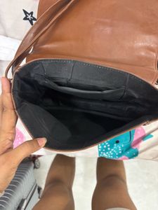 Brown sling bag