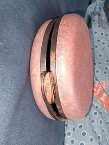 Sparkly Pink Round Clutch