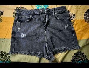 Black high-waisted denim shorts