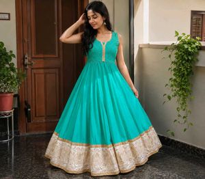 Stunning Teal Ethnic Gown with Golden Border