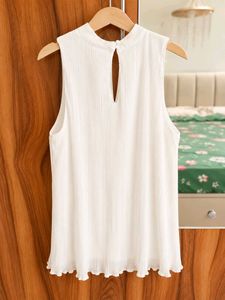 Chic White Sleeveless Top with Floral Detail