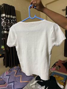 Cute White V-Neck Top with Heart Detail