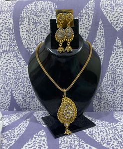 Gold-Tone Necklace and Earring Set with Mangtika