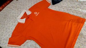 Orange T-shirt with white accents