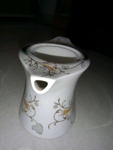 Vintage Gravy Boat with Ornate Design