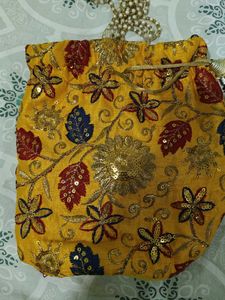 Embroidered Yellow Potli Bag