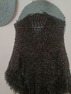 Stylish Black and Golden Knit Poncho with Fringe