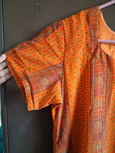 Vibrant Orange Printed Kurta Set