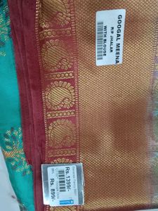 Beautiful Teal Saree with Gold Border