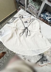 Chic White Cami Top with Black Trim