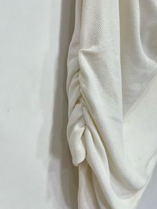 ruffle white top