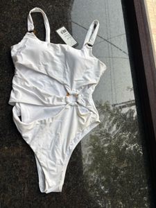Chic White One-Piece Swimsuit with Cut-outs