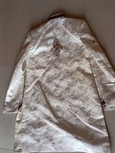 Heavy handwork ivory sherwani, for wedding functions..